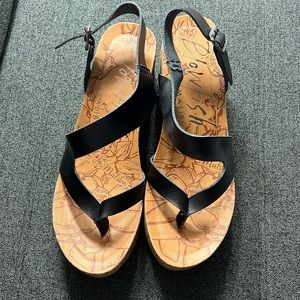 Brand new. Never worn. Women’s blowfish wedge sandals.